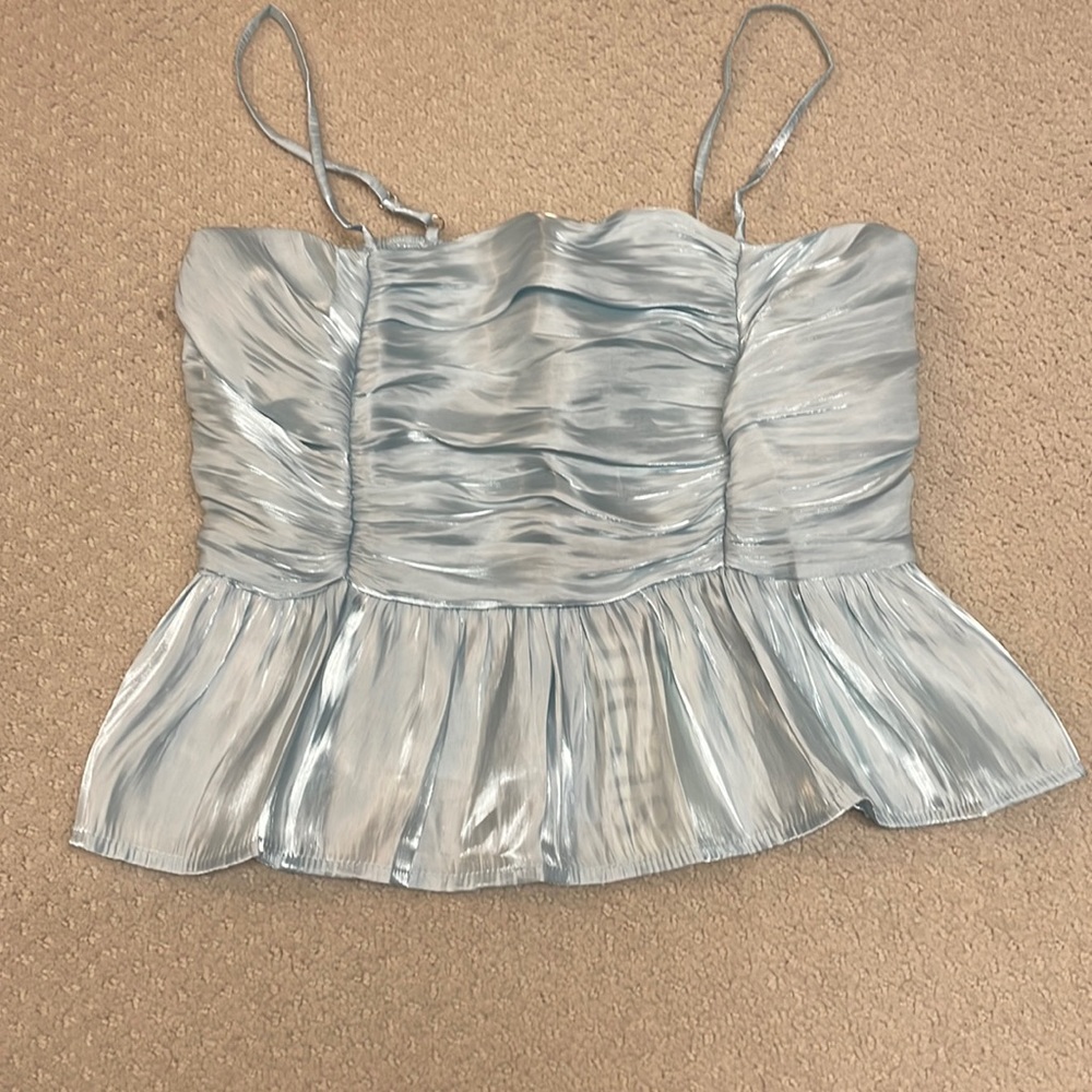 shiny blue top